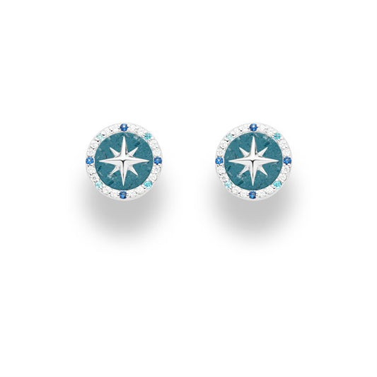 Ohrstecker "Kompassrose 2.0" aus rhodiniertem 925er Sterling-Silber, mit Zirkoniasteinen in Weiß, Hellblau und Dunkelblau besetzt, innen mit blauem Steinsand (Kyanit) gefüllt.